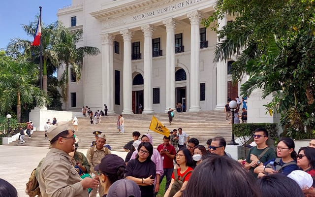 Members of Renacimiento Manila holding the Battle of Manila Tours